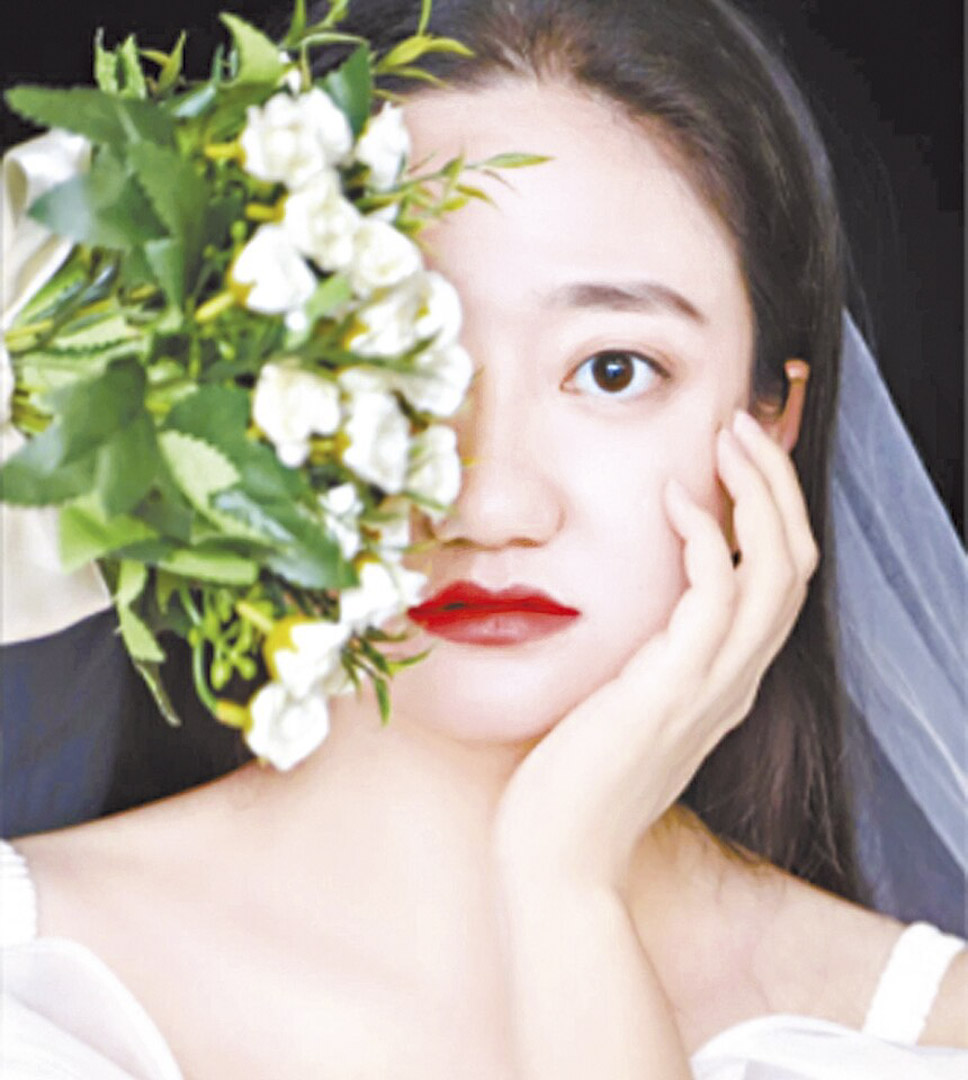李翹楚早前獨自拍了婚紗照,希望今後有機會把照片寄給許志永。