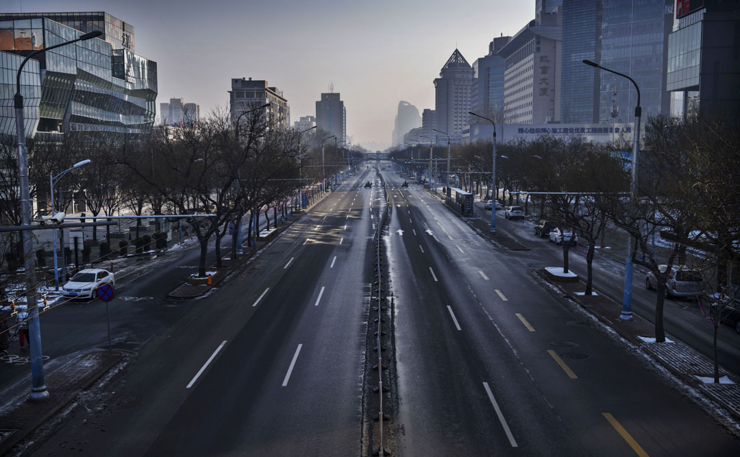 2020年2月9日,北京一條幾乎空無一人的街道。攝:Kevin Frayer/Getty Images