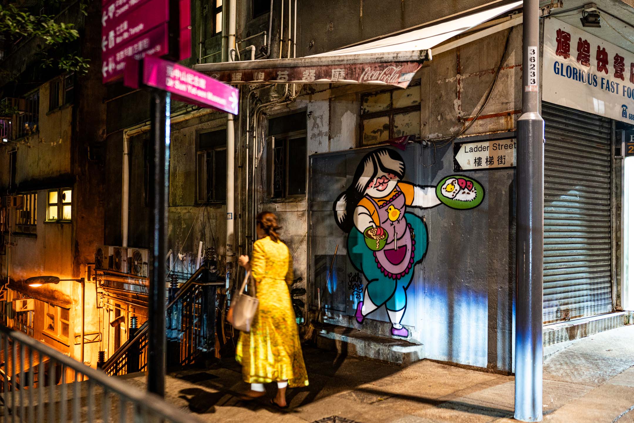 2023年8月27日,“辉煌快餐店”门外已换上新的壁画。摄:Ryan Lai/端传媒