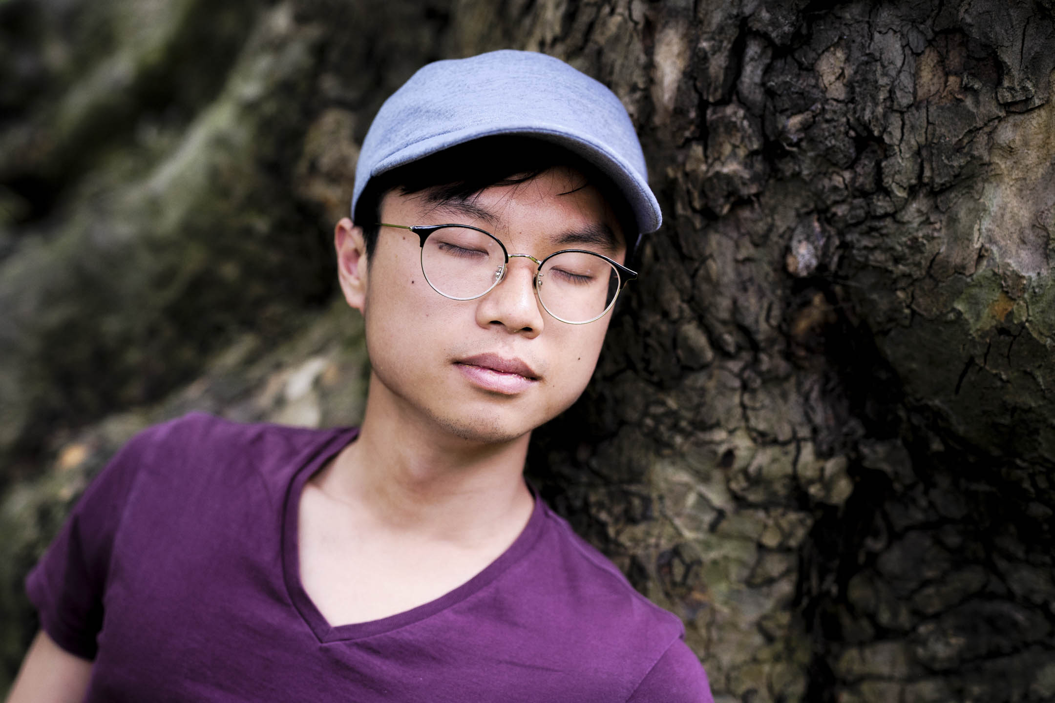 離開香港後,區倬僖才發現自己內在是有創傷的。攝:ST Wong/端傳媒